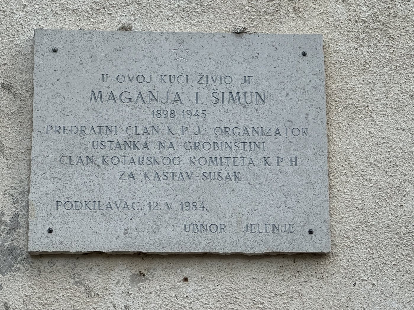 Stone plaque on the Maganja house in Croatian